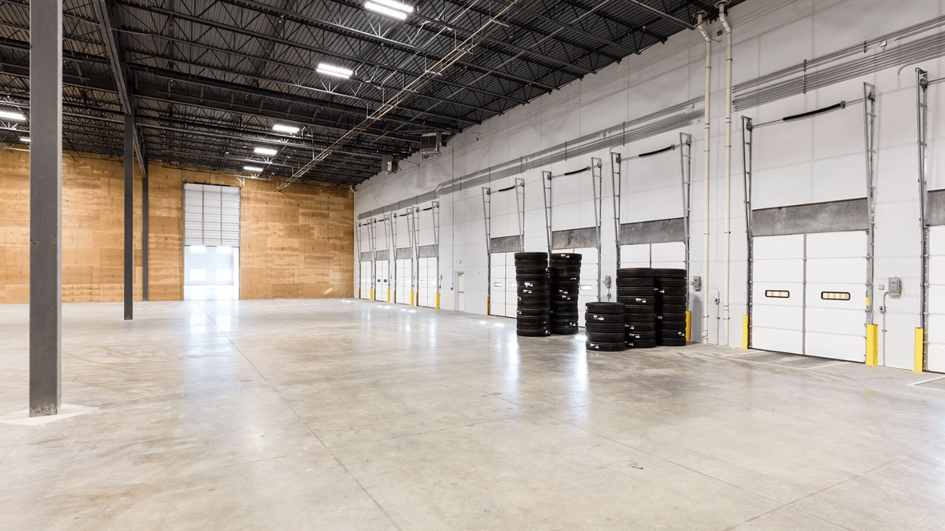 A view of an empty warehouse inside Point S Tires Regional Warehouse.