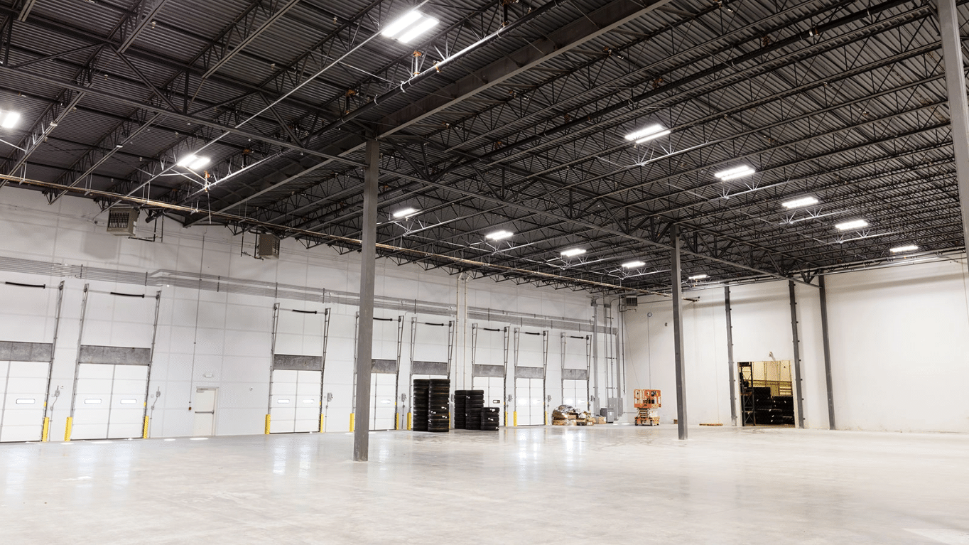 A view of an empty warehouse inside Point S Tires Regional Warehouse.