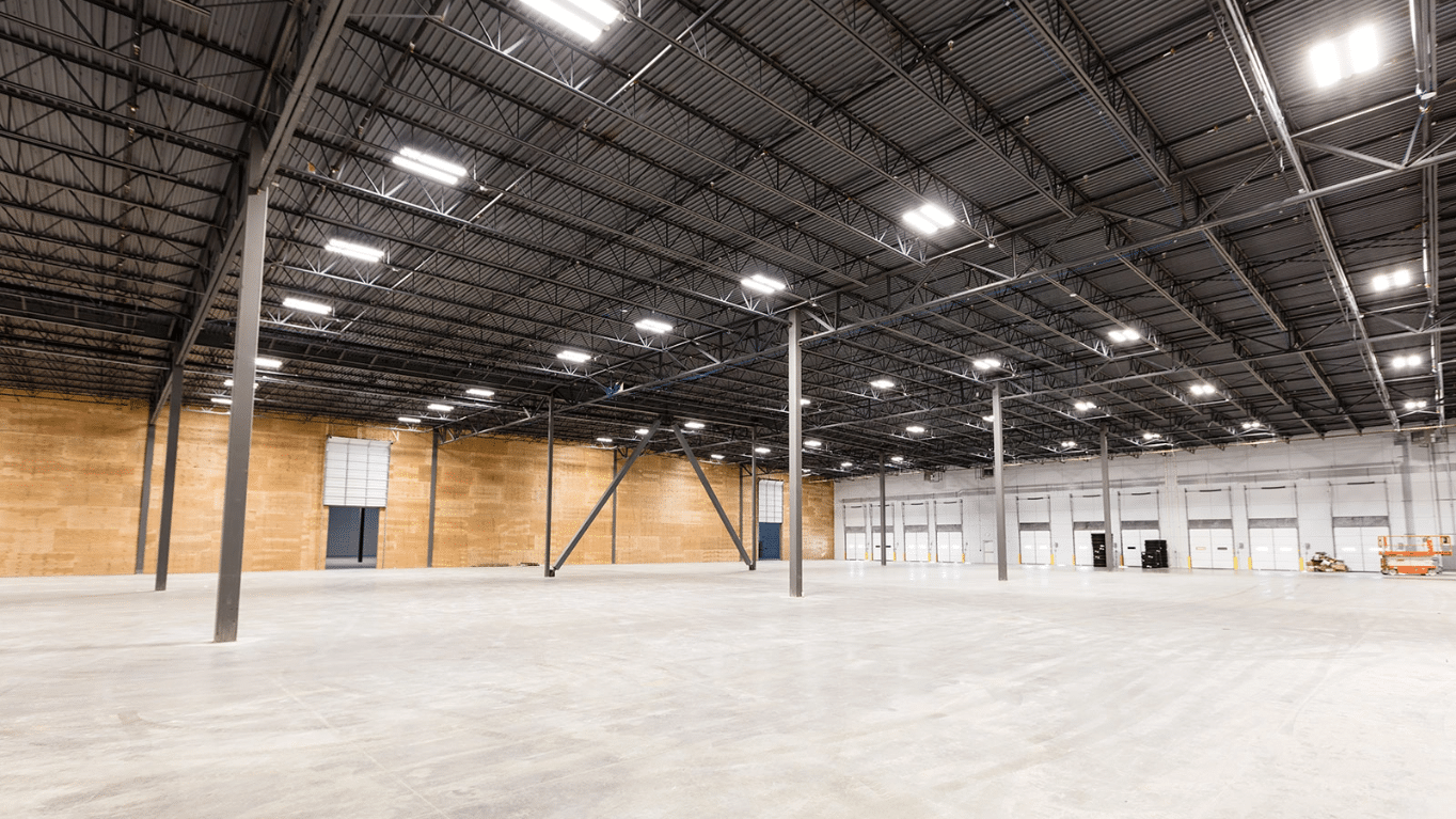 A view of an empty warehouse inside Point S Tires Regional Warehouse.