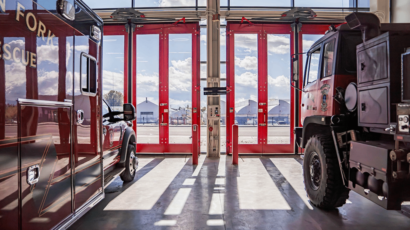 Firetrucks inside American Fork Fire Station 52.