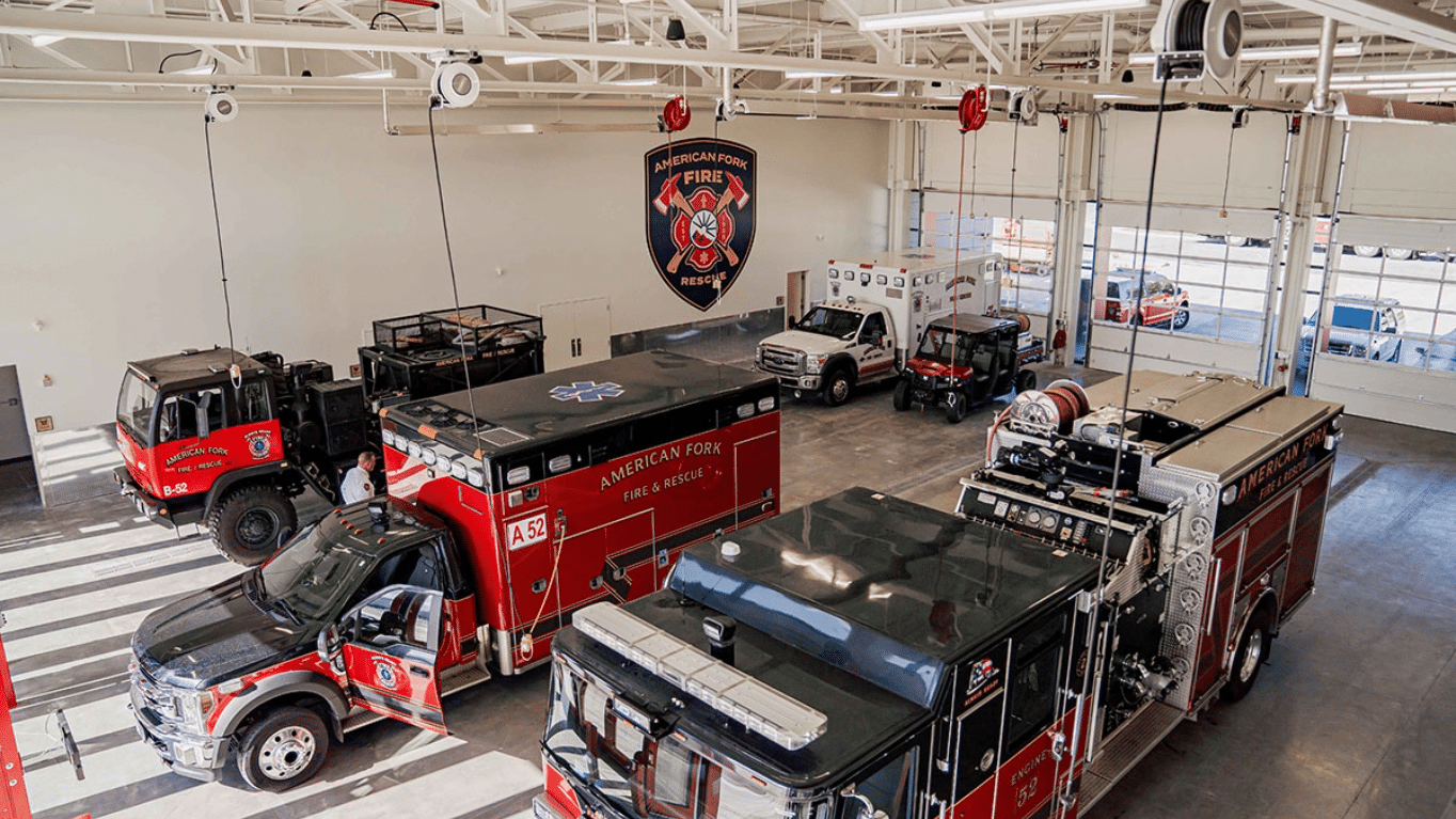 Firetrucks inside American Fork Fire Station 52.