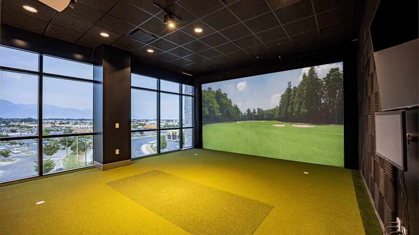 Golf room inside Hunter's Grove building.