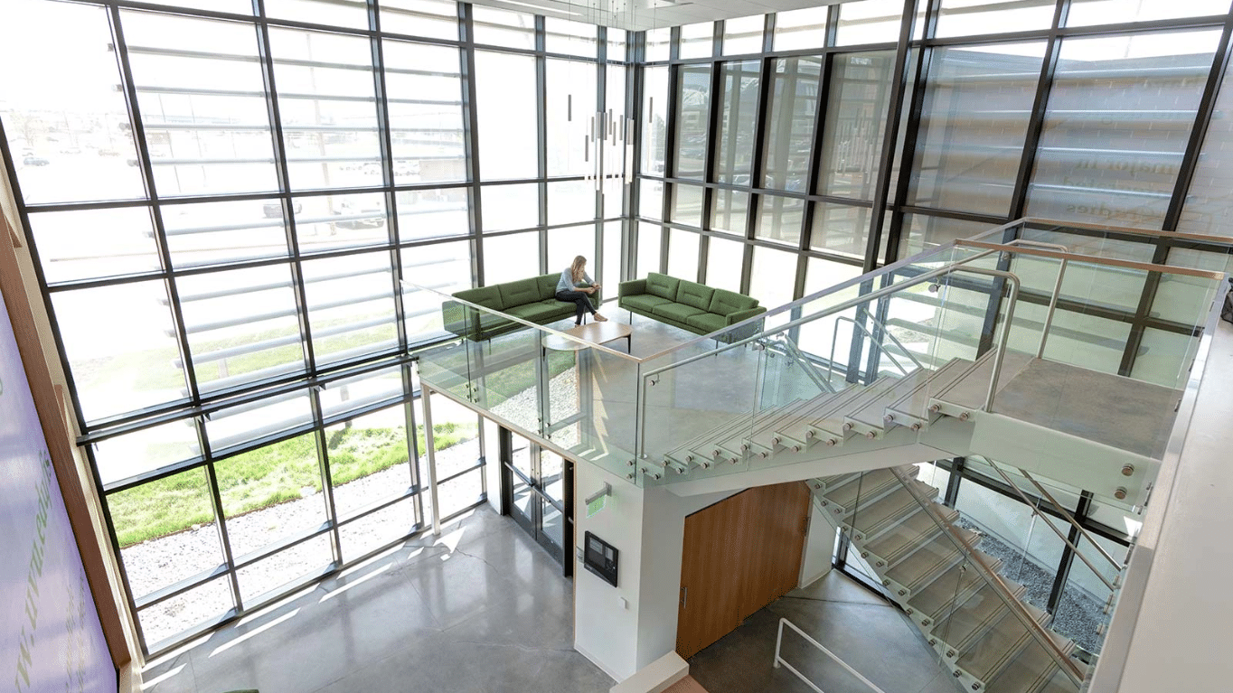 A view of Utah Valley University (UVU) Young Living Alumni Center staircase and lobby.