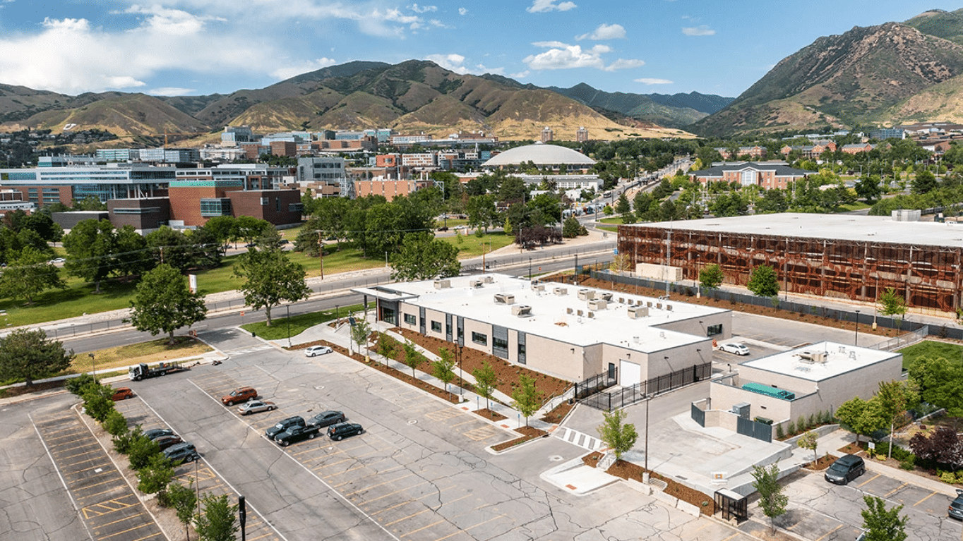 Aerial view of University of Utah Public Safety Building building and parking lot.